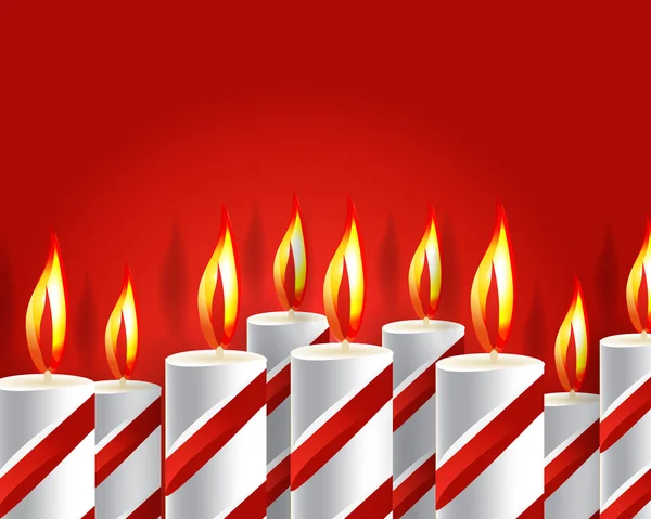 Hořící svíčka a stín na červeném pozadí — Stock fotografie