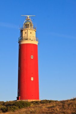 deniz kum tepeleri ve deniz feneri ile