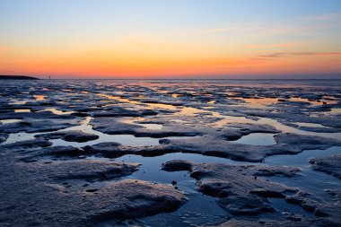 Reflection of the sunset in the ocean