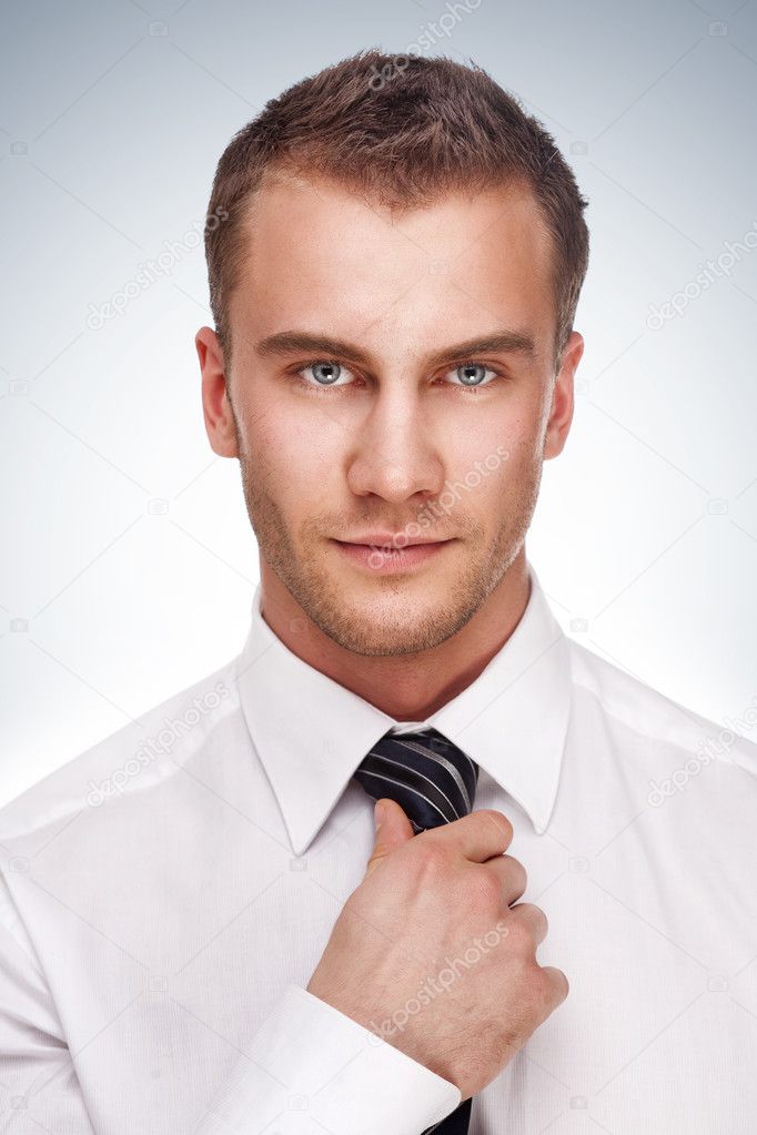 Studio shot of a business man on gradient background