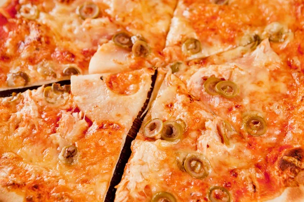 Stock image Cut slices of pizza