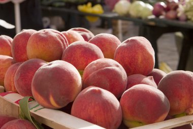Ripe Peaches At Market clipart