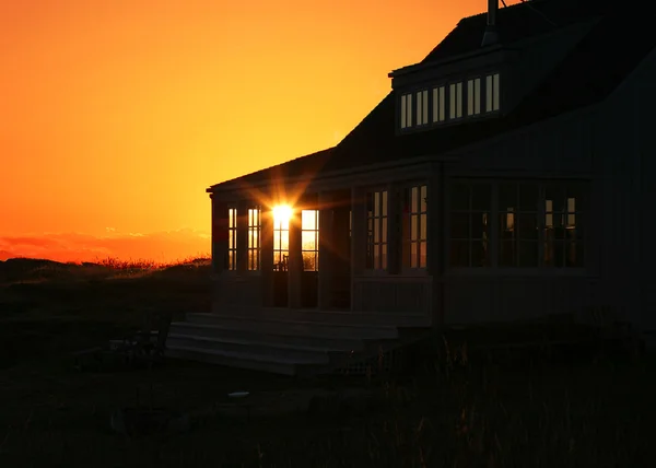 Vakantie huis zonsondergang Rechtenvrije Stockfoto's