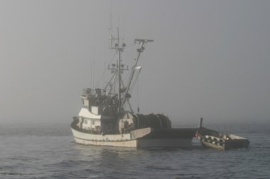 Fishing Boat In Fog clipart