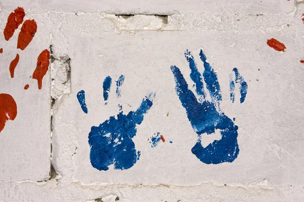 stock image Red And Blue Handprints