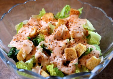 Fresh Garden Salad With Dressing And Croutons clipart