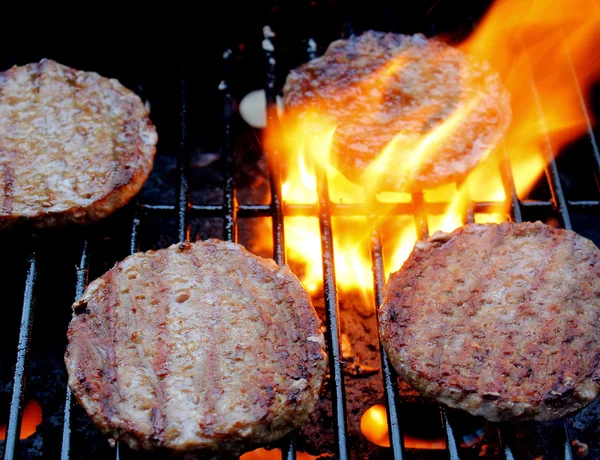 Sizzling Burgers On The Grill — Stok fotoğraf