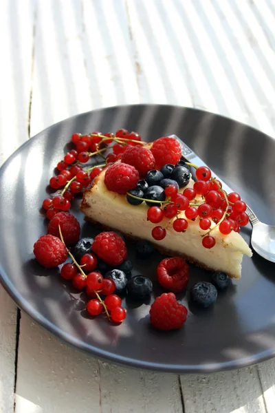 Bite of cheesecake — Stock Photo, Image