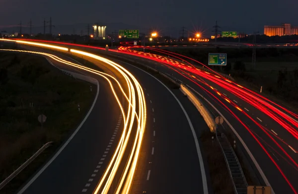 stock image Night highway - long exposure - car light lines