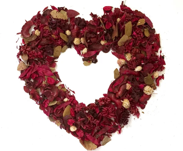 Heart made of dried flowers — Stock Photo, Image