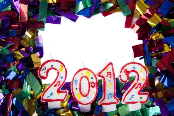 Копирайт с конфетти и свечами 2012 года — стоковое фото