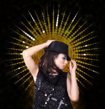 Woman with fedora dancing in a nightclub clipart