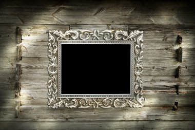 Silver frame on wooden background clipart