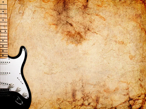 Grunge arka plan üzerinde Vintage elektro gitar — Stok fotoğraf
