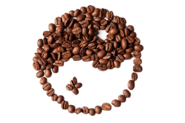 Brązowy i biały symbol składa się z ziaren kawy na biały deseń — Zdjęcie stockowe
