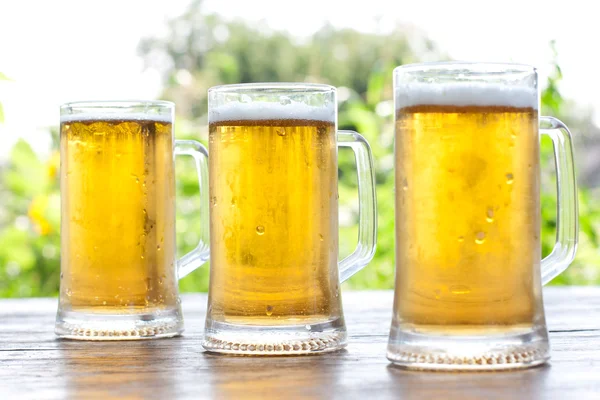 Три чашки пива — стокове фото