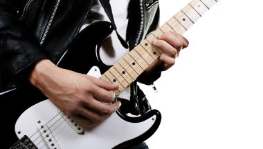 Guitarist playing on electric guitar clipart