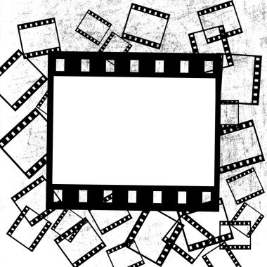 Film pieces on grunge background clipart