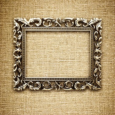 Golden frame on a canvas background clipart