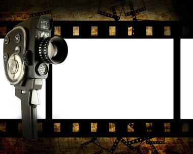 Film pieces on grunge background clipart