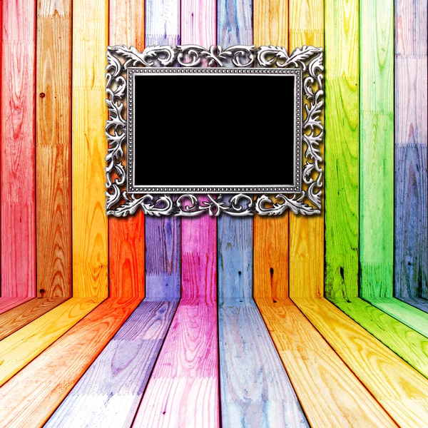 Frame in colorful wooden room — Stock Photo, Image