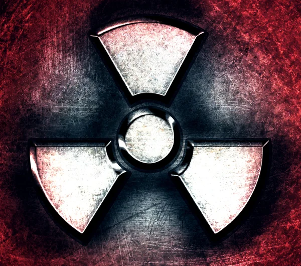 Símbolo de radiación sobre un fondo de acero —  Fotos de Stock