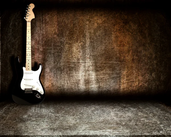 Kytara v ocelové místnosti — Stock fotografie
