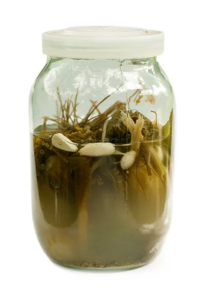 Old glass jar with marinated cornichons — Stock Photo, Image