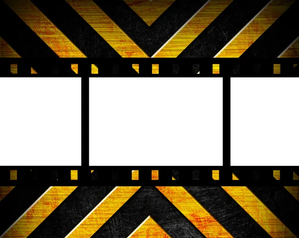 Old film strip on the danger background — Stock Photo, Image