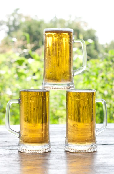 Tři hrnek piva — Stock fotografie