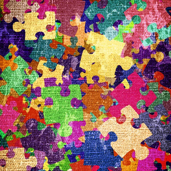 Tło grunge z kolorowe puzzle — Zdjęcie stockowe