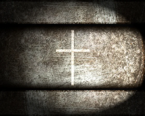 Крест на стальном фоне — стоковое фото