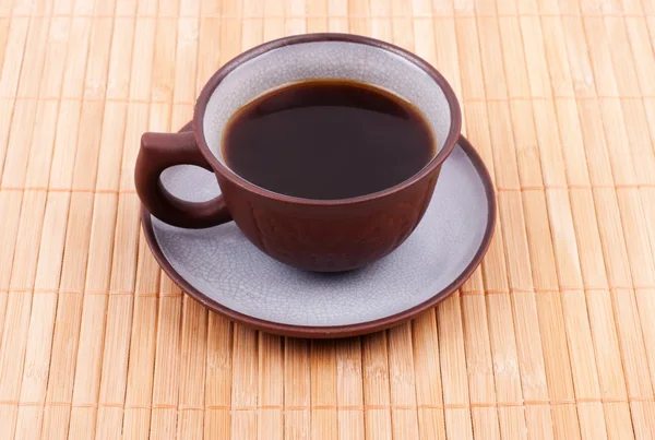 Чашка кофе на бамбуке — стоковое фото