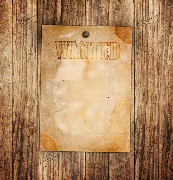 Vintage wanted poster on a wooden wall — Stock Photo, Image