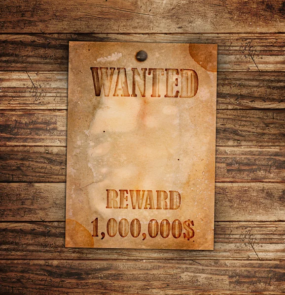 Vintage wanted poster on a wooden wall — Stock Photo, Image