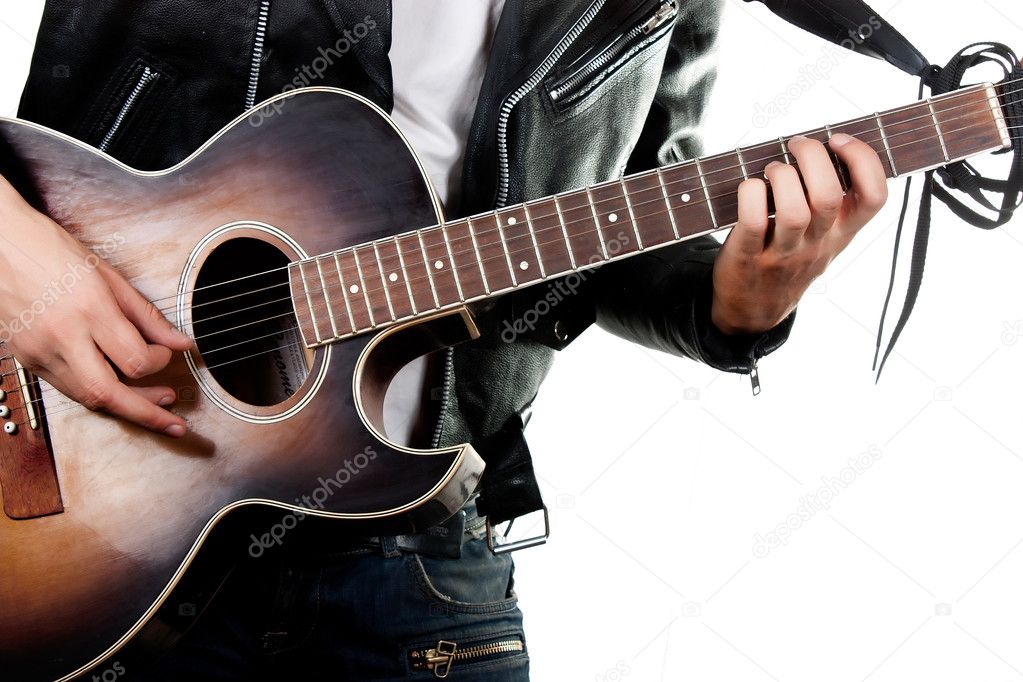Guitarist playing on acoustic guitar isolated on white backgroun
