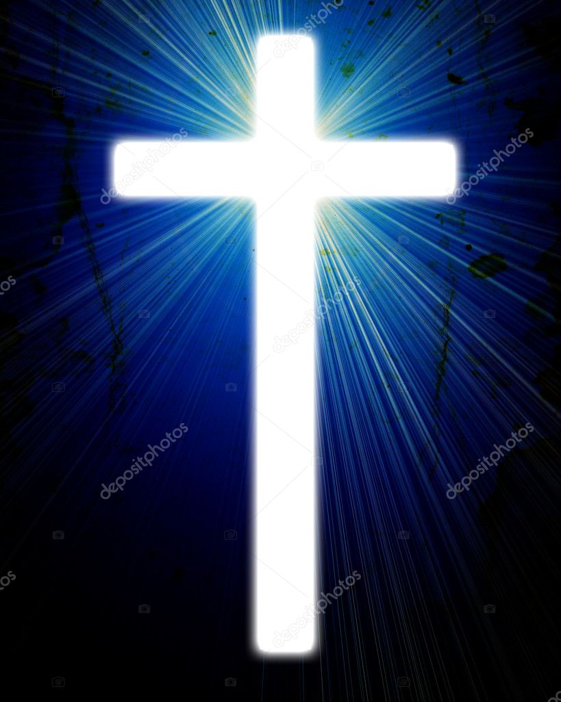Glowing cross on a grunge background