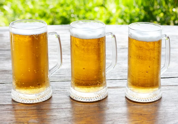 Tři hrnek piva — Stock fotografie