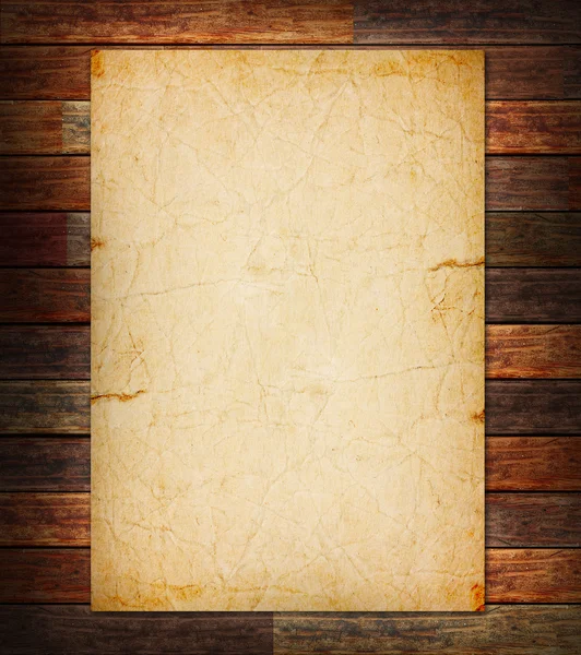 Vecchia carta sullo sfondo di legno — Foto Stock