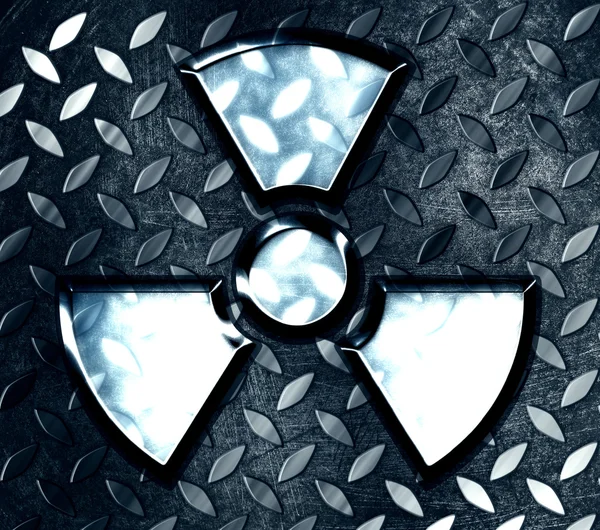Símbolo de radiación sobre un fondo de acero —  Fotos de Stock