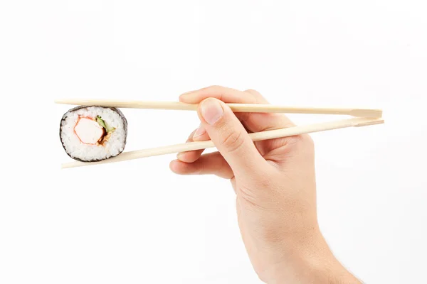 Sushi in a hand — Stock Photo, Image