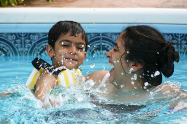 Family fun in the pool clipart