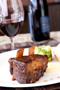 Braised Cumbrae's Short Rib served with Wine clipart