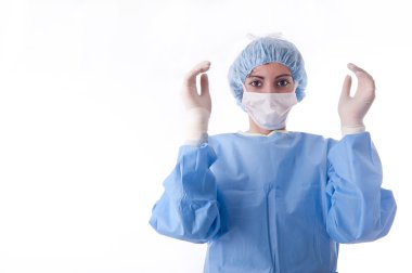 Sterile feminine nurse or doctor with the hands up clipart