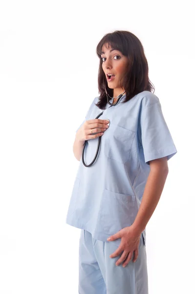 Médecin ou infirmière avec stéthoscope étonné — Photo