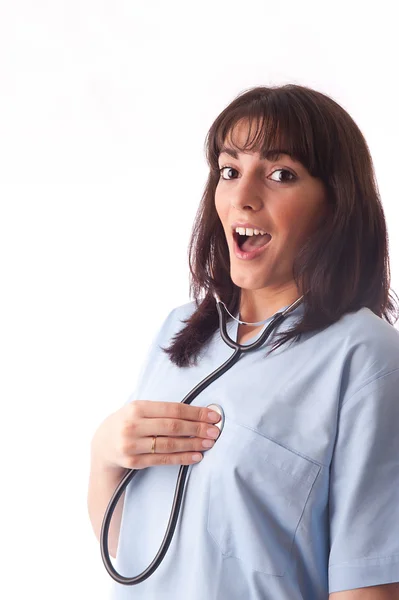 Ärztin oder Krankenschwester mit Stethoskop erstaunt — Stockfoto