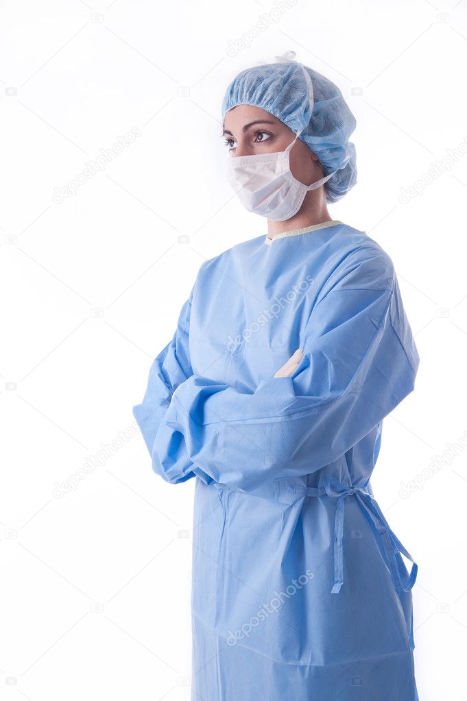 Seterile femal nurse or sugeon waiting looking to the side