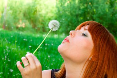 Woman with dandelion clipart