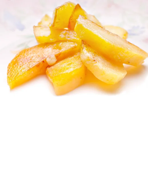 Fried appetizing slices of a potato — Stock Photo, Image