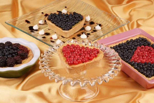 Assorted tarts with berries — Stock Photo, Image
